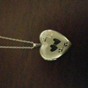 Sterling silver heart shaped locket.